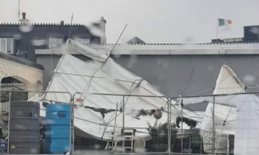 Outdoor dining structure collapses as storm batters the town